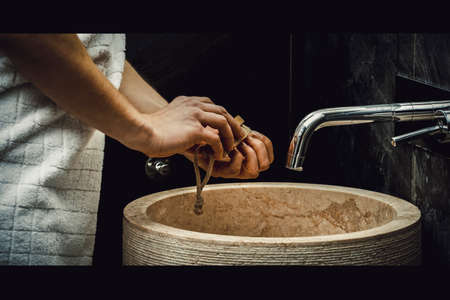 Woman cleaning her hands.の写真素材