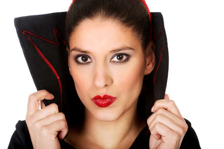 Woman in devil carnival costume.の写真素材