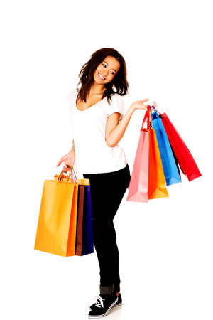 Happy smiling woman with shopping bags.の写真素材
