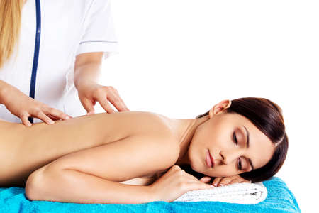 Woman having massage of body in the spa salon. Beauty treatment concept.の写真素材