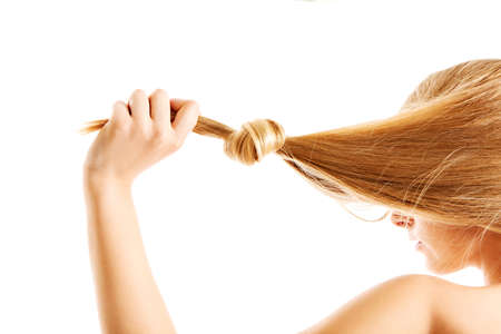 Blonde hair knot isolated on white background.の写真素材