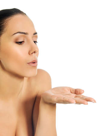 Beautiful topless woman blowing a kissの写真素材