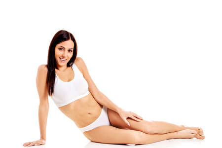 Young, sporty, fit and beautiful girl in sporty underwear.の写真素材