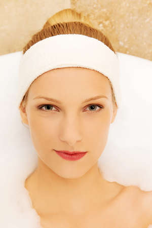 A young woman in the bathの写真素材