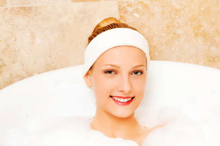 A young woman in the bathの写真素材