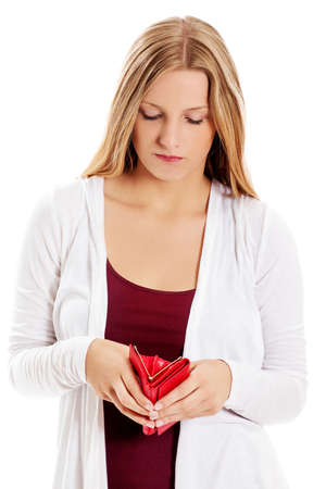 Young woman shows her empty wallet. Bankruptcyの写真素材