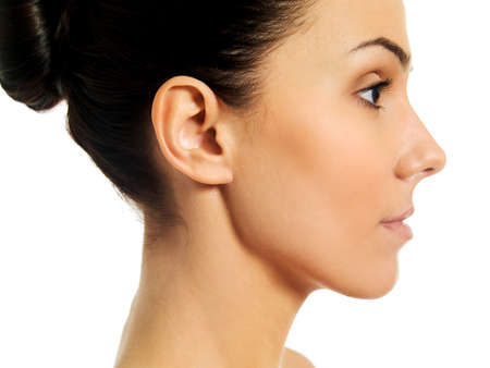 Side view of young woman face.の写真素材