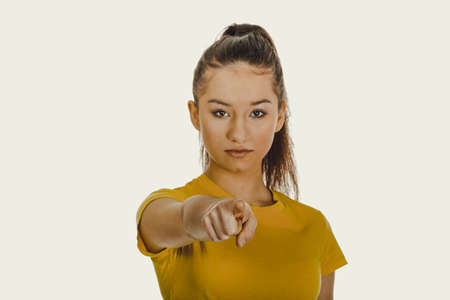 Young woman pointing on you.の写真素材
