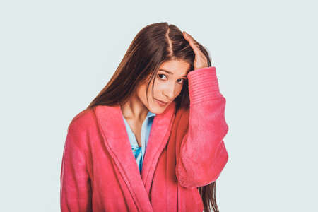 Beautiful woman in pink bathrobe.の写真素材