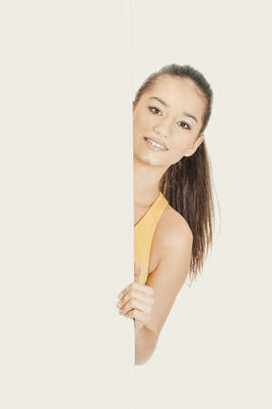 Fitness woman with empty placard.の写真素材