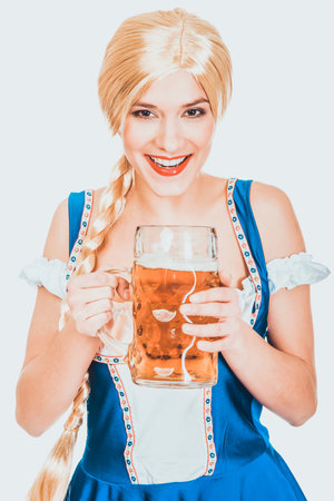 Beautiful bavarian woman with beer.の写真素材