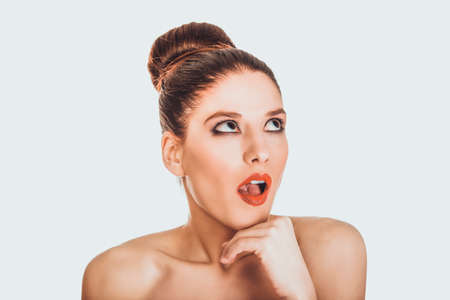 Beautiful topless shocked woman with make up.の写真素材