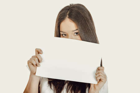 Young happy woman with blank board.の写真素材