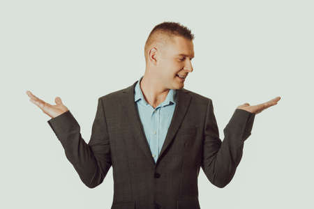 Businessman with empty both handsの写真素材