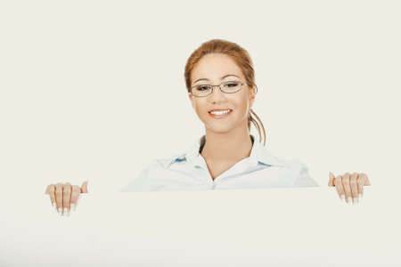 Business woman presenting your product.の写真素材