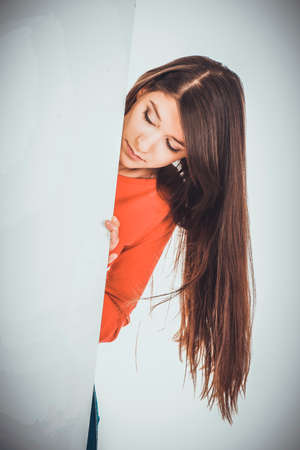 Happy woman holding empty banner.の写真素材