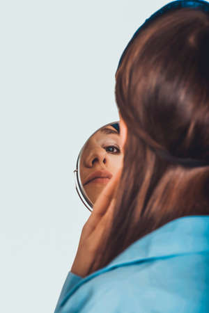 Young morning woman in big shirt.の写真素材