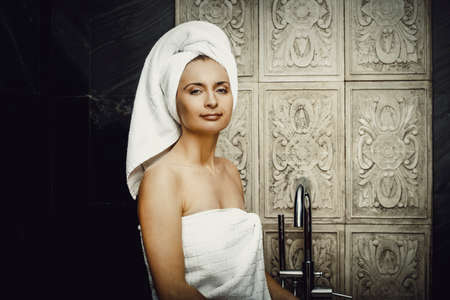 Natural beautiful woman in bathroom.の写真素材