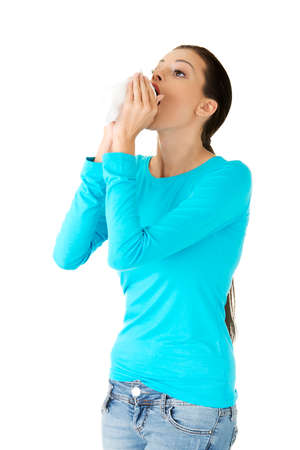 Teen woman with allergy or cold.の写真素材