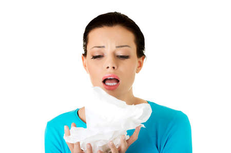 Teen woman with allergy or cold.の写真素材