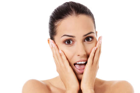 Shock and surprised beautiful young woman.の写真素材
