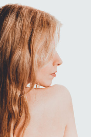 Topless woman back to cameraの写真素材