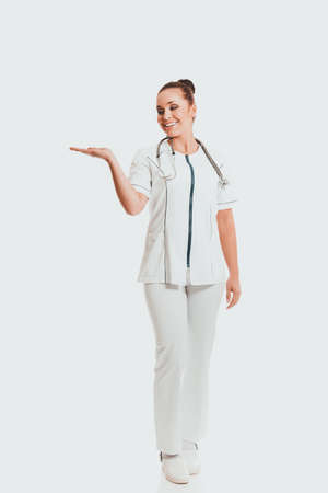 Female doctor presenting copyspaceの写真素材