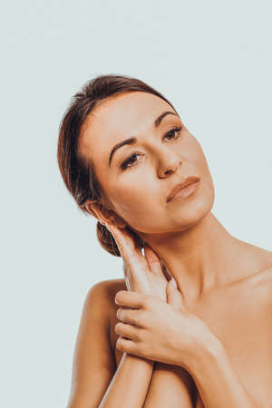 Spa woman touching her chinの写真素材