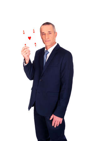 Elegant businessman with red ace cardの写真素材
