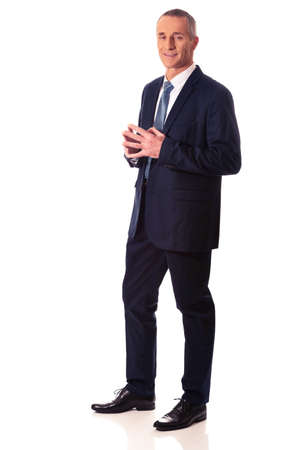 Businessman with clenched handsの写真素材