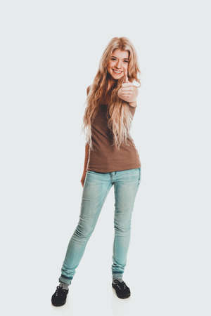 Student woman showing thumb upの写真素材