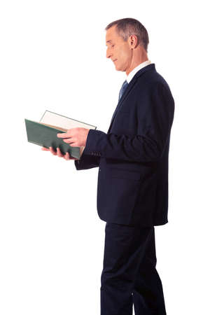 Businessman reading his note bookの写真素材