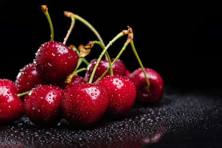 Heap of juicy wet cherries.の写真素材