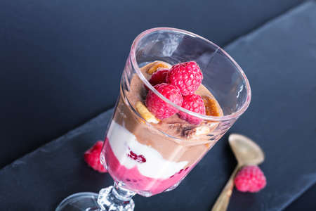 Glass of chocolate and rapsberry dessertの写真素材