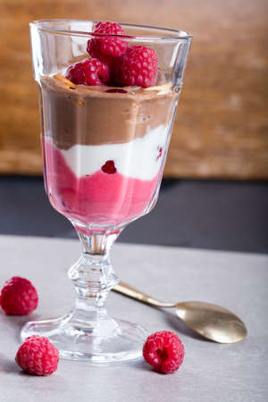 Glass of chocolate and rapsberry dessertの写真素材