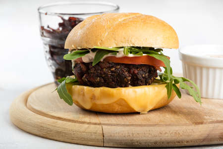 Vegetarian burger with cheese and vegetables.の写真素材