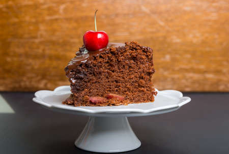 Chocolate cake with juicy cherries.の写真素材