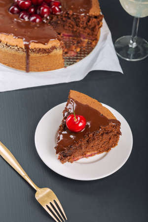 Chocolate cake with juicy cherries.の写真素材