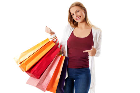 Beauty hhopping woman holding bagsの写真素材