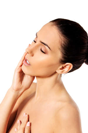 Beautiful face of young woman with clean fresh skin.の写真素材