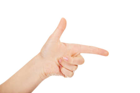 Woman's two finger like a gun.の写真素材