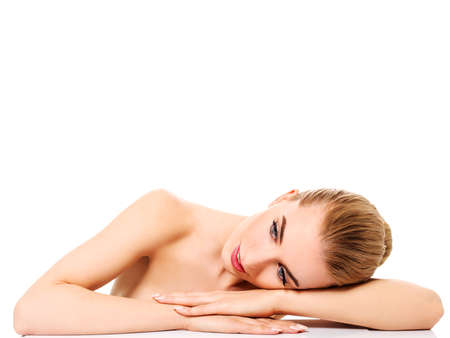 Beautiful model girl with perfect fresh clean skin. Youth and skin care concept.の写真素材