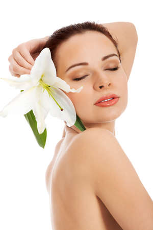 Beauty woman portrait. Beautiful model girl with perfect fresh clean skin. Body care conceptの写真素材