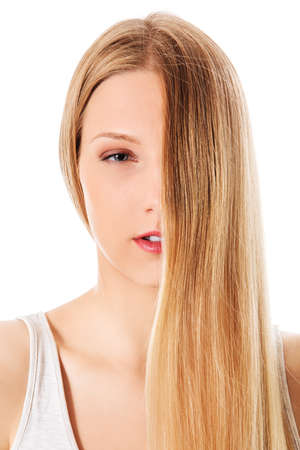 Blond hair. Beautiful woman with straight long hair.の写真素材