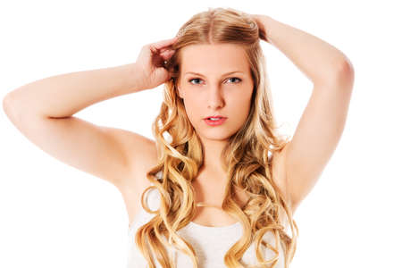 Beautiful young woman with gorgeous hairstyle.の写真素材