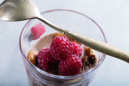 Glass of chocolate and rapsberry dessert.の写真素材
