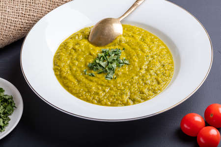 Green squash soup with parsley.の写真素材