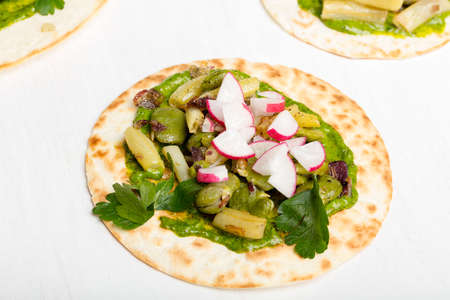 Tortilla wrap bread with vegetables.の写真素材