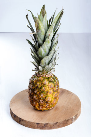 Fresh juicy pineapple on the table.
