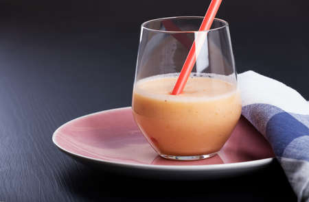 Glass of fresh fruit smoothie.の写真素材